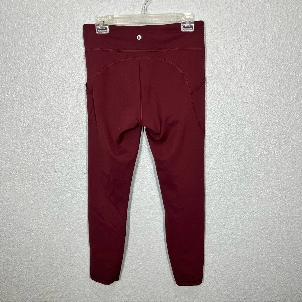 Lululemon Invigorate 25” maroon leggings - Picture 6 of 9